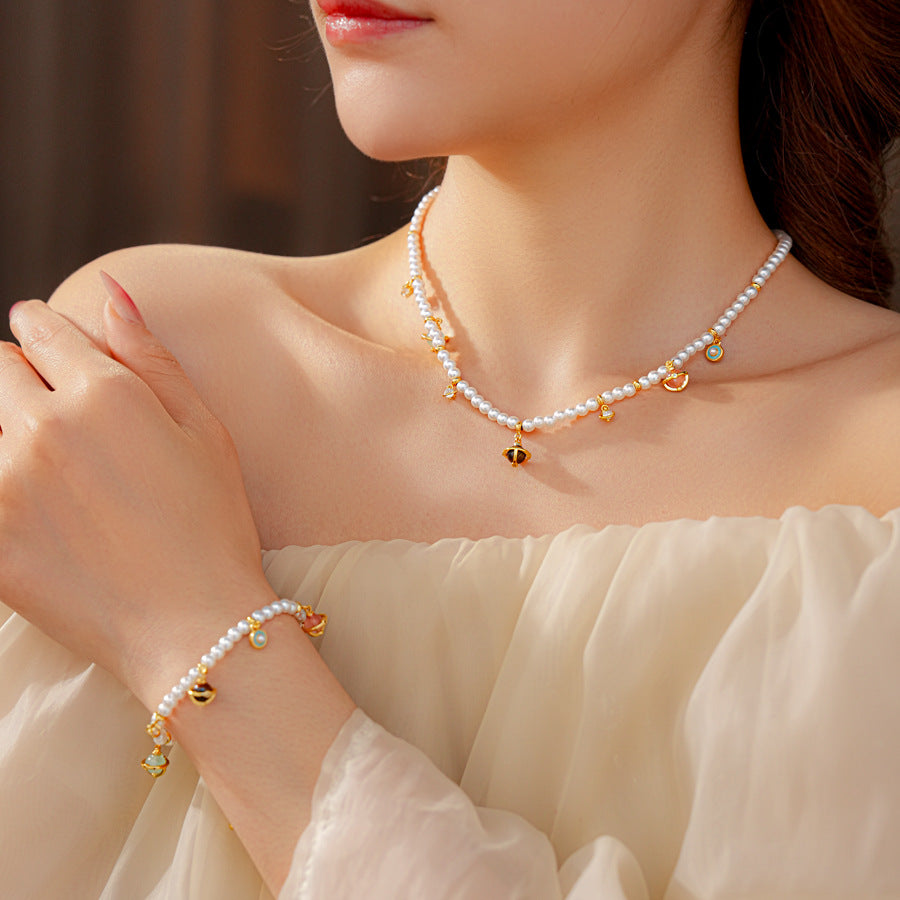 Fleur de Pearl Luxe Set with pearl necklace and matching zircon-accented bracelet, elegant and romantic