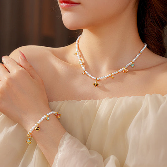 Fleur de Pearl Luxe Set with pearl necklace and matching zircon-accented bracelet, elegant and romantic