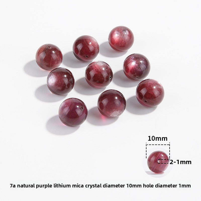 Lepidolite-in-Quartz crystal round beads with berry-pink striations, assorted 8–15 mm.