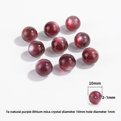 Lepidolite-in-Quartz crystal round beads with berry-pink striations, assorted 8–15 mm.