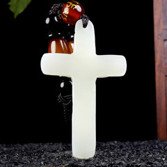 Hetian (nephrite) white jade crucifix pendant close-up – Sacred Light, 48×29×9 mm