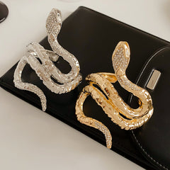 Serpent Luxe Cuff bracelet in gold and silver with rhinestone snake design