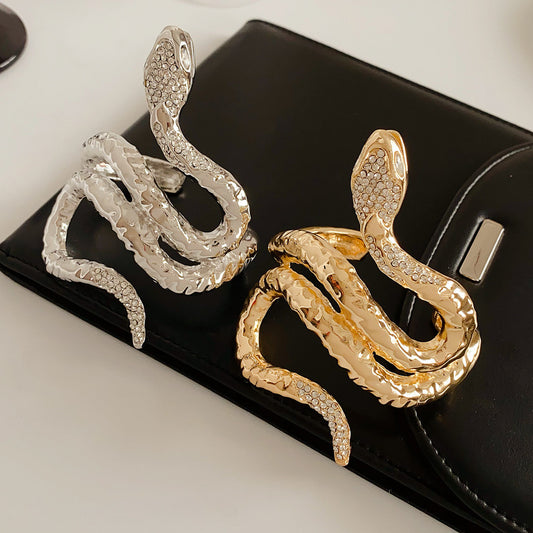 Serpent Luxe Cuff bracelet in gold and silver with rhinestone snake design