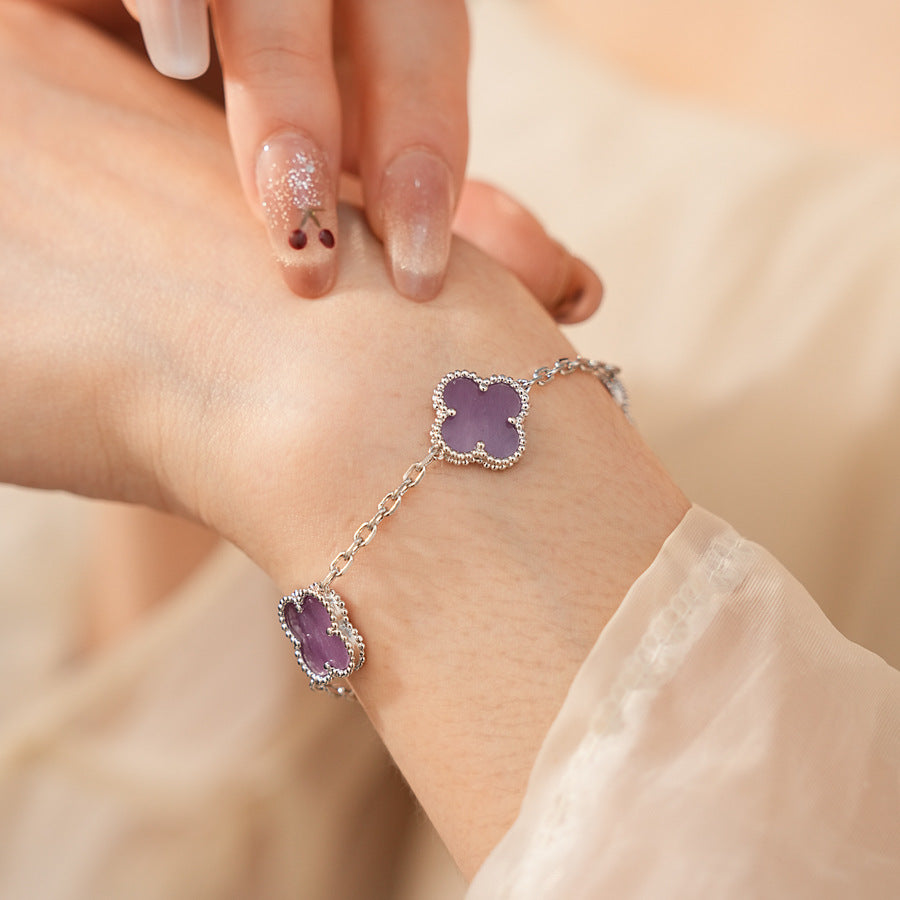 Violet Fleur Elegance Bracelet with violet clover motifs and golden beaded frames on chain