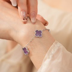 Violet Fleur Elegance Bracelet with violet clover motifs and golden beaded frames on chain