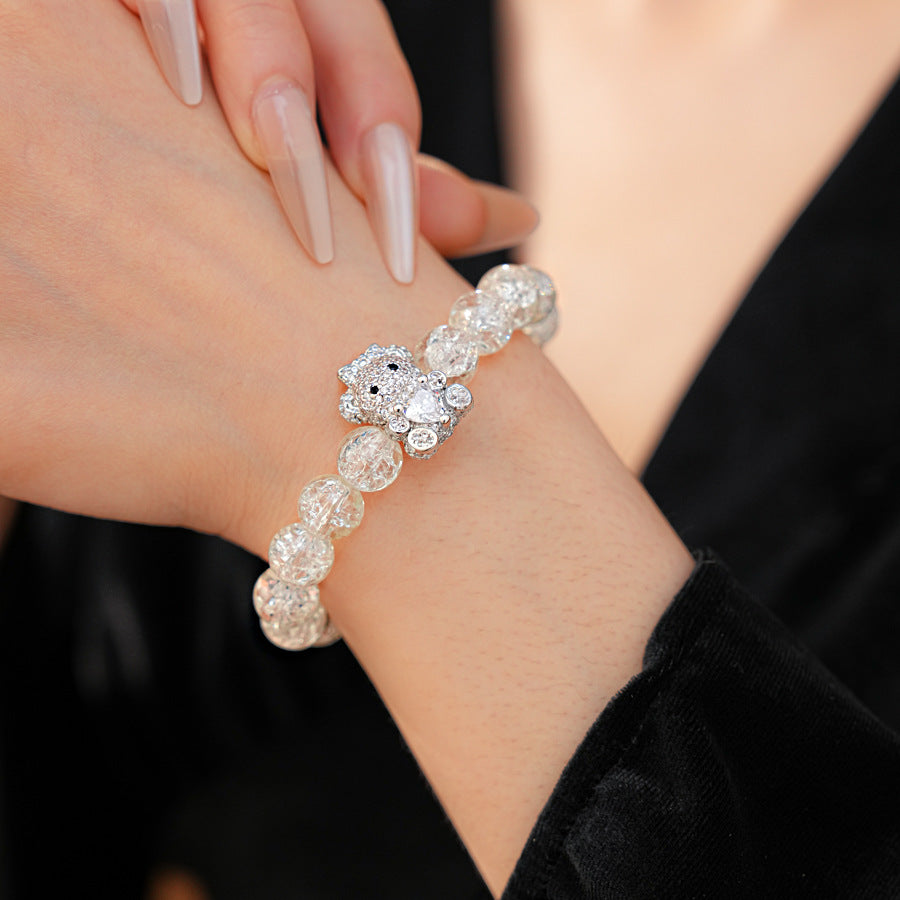 Clear crackle-glass beaded bracelet with pavé bear charm holding a heart — Glacial Heart Bear Bracelet.