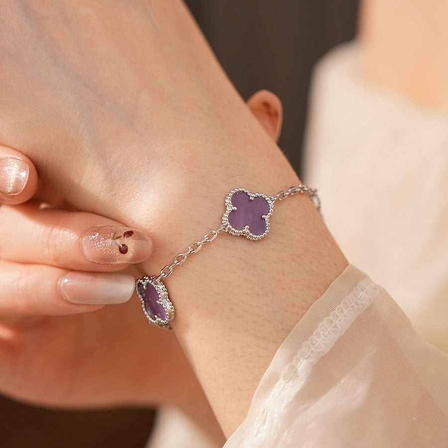 Violet Fleur Elegance Bracelet with violet clover motifs and golden beaded frames on chain