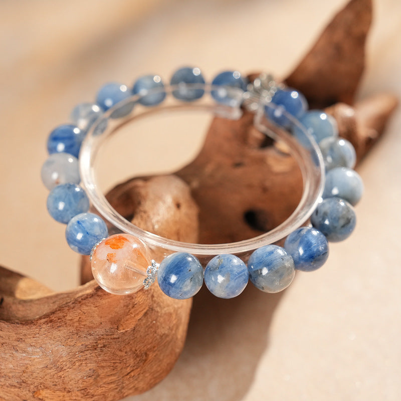 Natural blue crystal bracelet featuring a red flower bead centerpiece — Azure Dawn Crystal Bracelet by Glazenya.