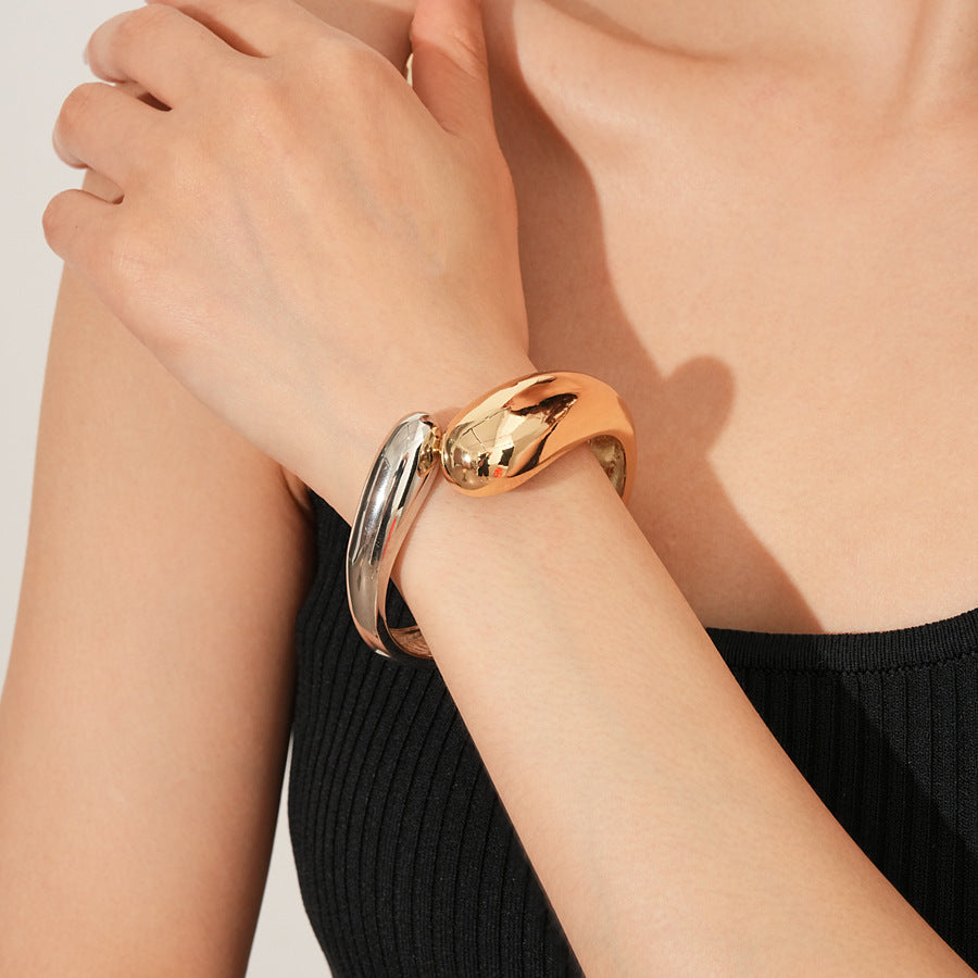 Fluid Fusion Duo Bangle in Gold and Silver – sculptural hinged design, high-gloss finish – Glazenya