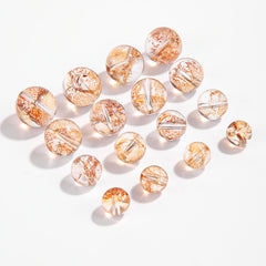 Clear crystal round beads with embedded gold foil and floral flakes — Gilded Bloom (8/10/12/14 mm).