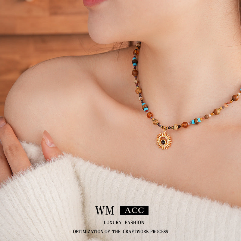 Sun pendant beaded necklace collection — multiple styles displayed