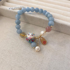 Cat’s Eye & Crystal Charm Bracelet Collection