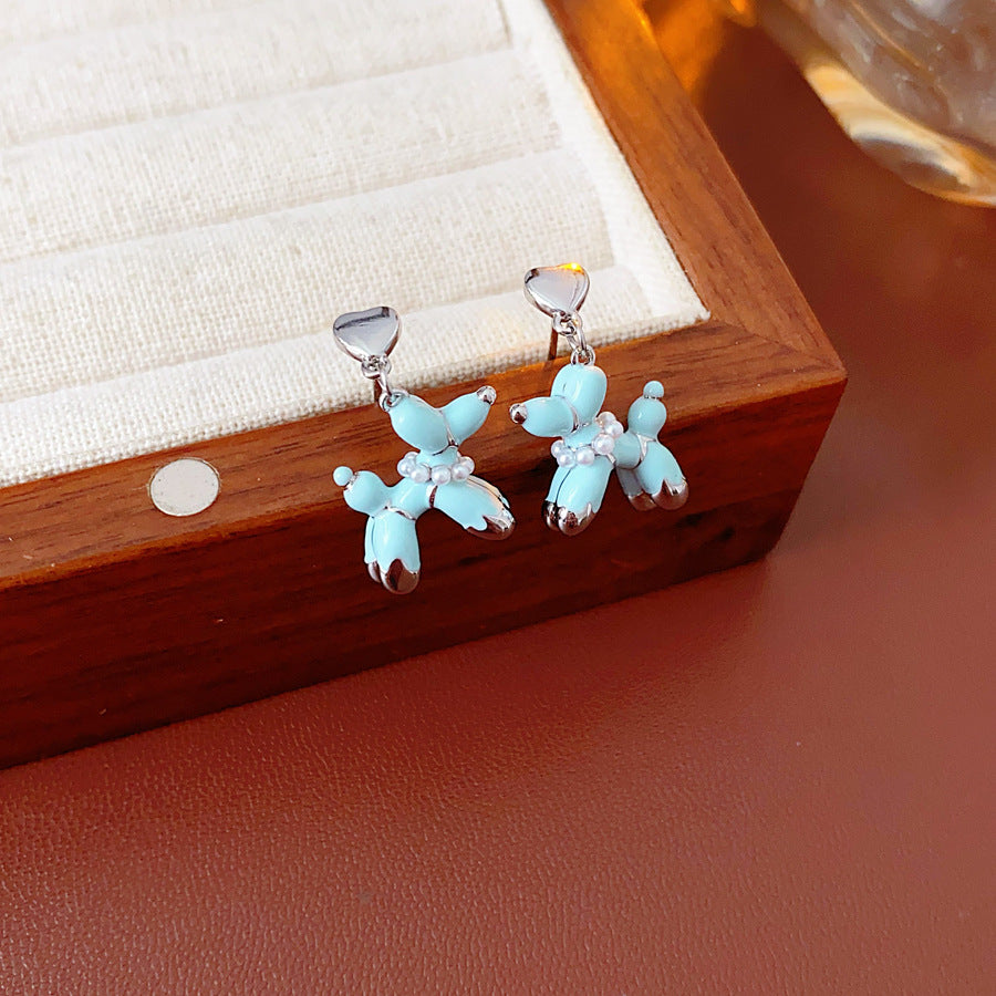 Silver-tone necklace and stud earrings with pastel blue balloon-dog charms — Blue Pup Pendant & Earrings Set.