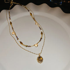Sun pendant beaded necklace collection — multiple styles displayed