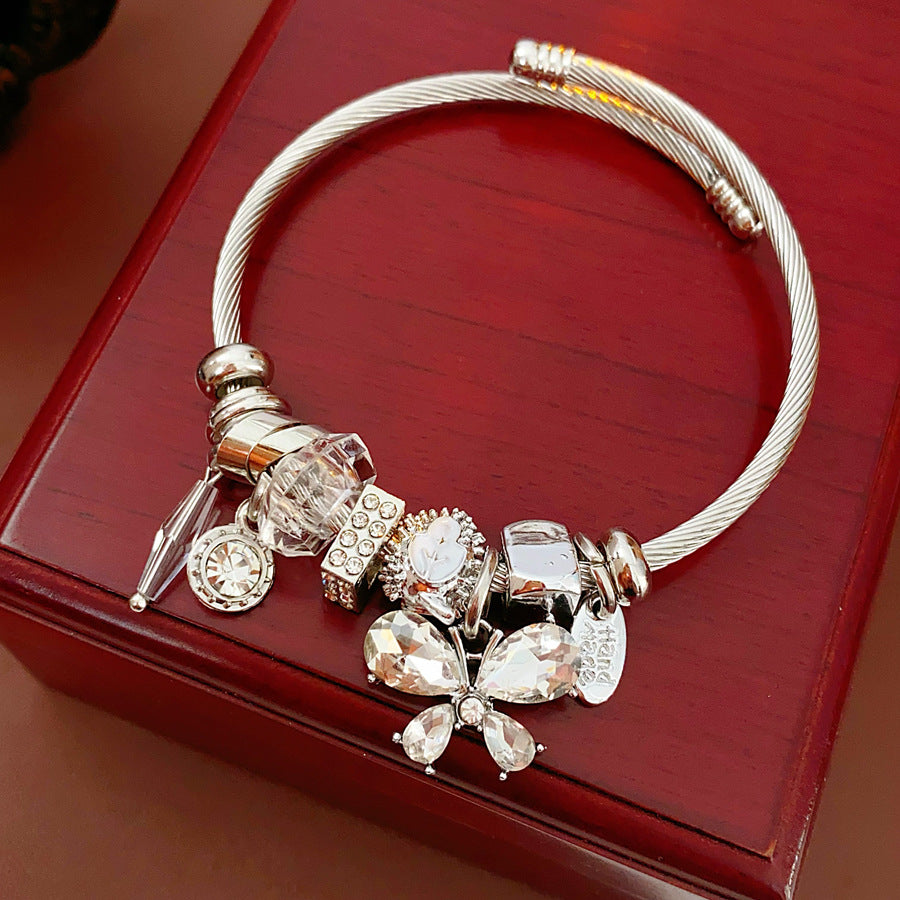 Glimmerwing Luxe Charm Bangle with butterfly and crystal charms – Glazenya jewelry