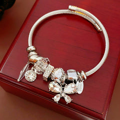 Glimmerwing Luxe Charm Bangle with butterfly and crystal charms – Glazenya jewelry