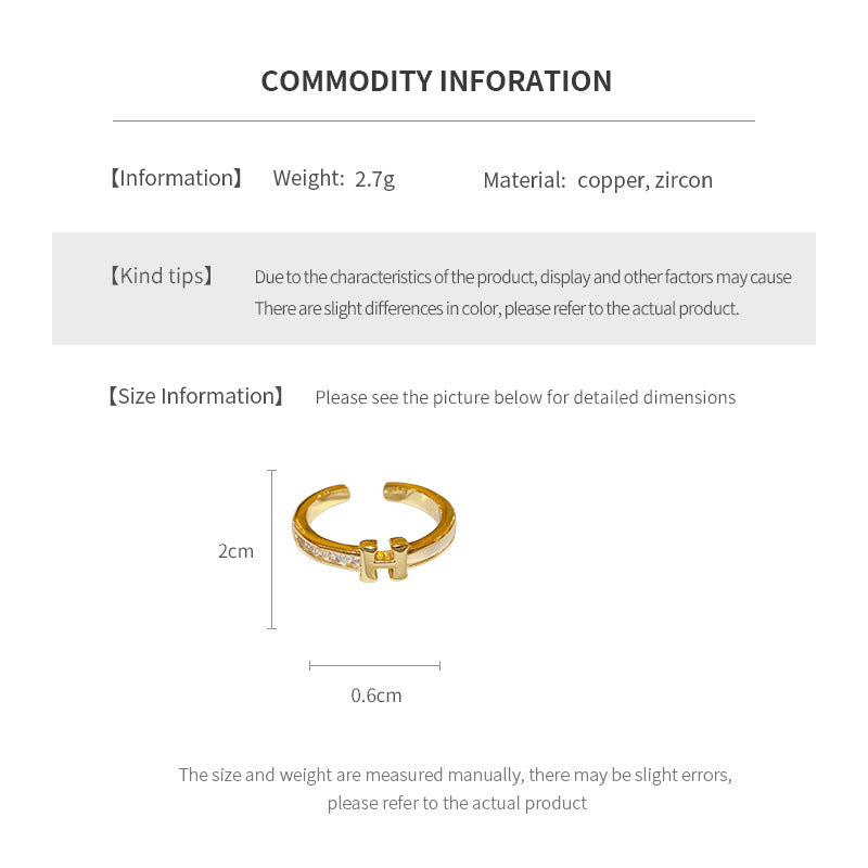 Gold-tone open ring with initial bridge and channel-set pavé cubic zirconia — Lumière Initial Pavé Open Ring.