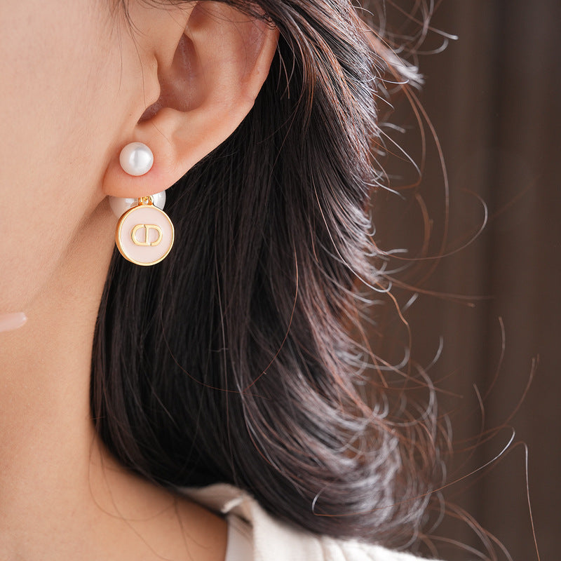Elegant double pearl stud earrings with bee and emblem coin charms — Bee & Emblem Double Pearl Studs.
