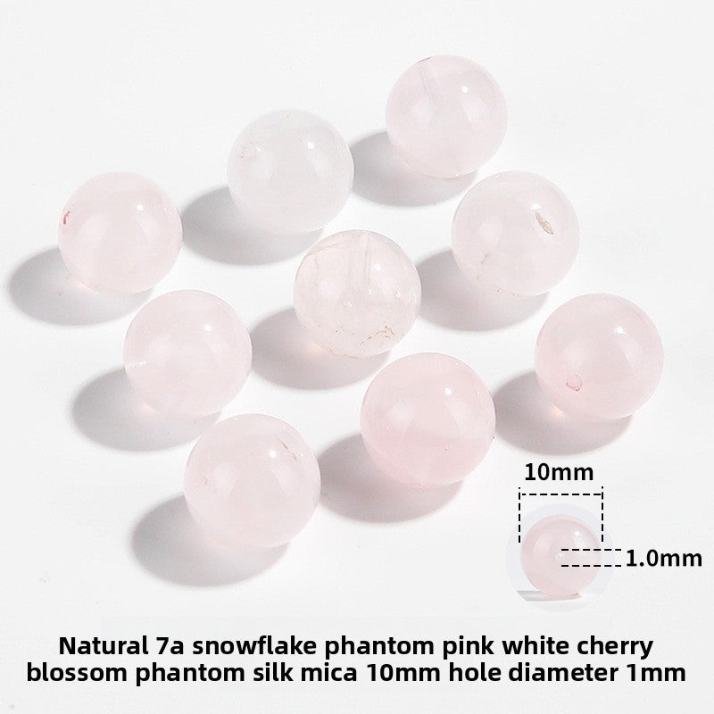 Snow Phantom Quartz round beads with frosty, snowflake-like inclusions—Frost-Mist Bloom (10/12 mm).