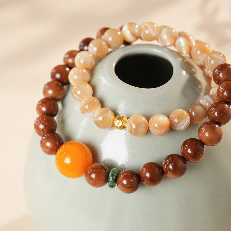 Dual-strand natural stone bracelet with amber centerpiece and shell beads in warm brown and beige tones – Glazenya light luxury jewelry