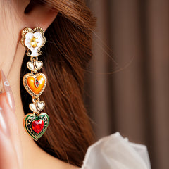 Enchanted Love Drop Earrings – vintage baroque heart-shaped dangle design with gold alloy and red crystal accents, 7cm length jewelry display