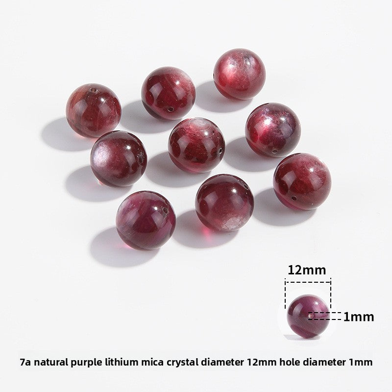 Lepidolite-in-Quartz crystal round beads with berry-pink striations, assorted 8–15 mm.