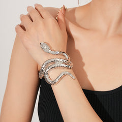 Serpent Luxe Cuff bracelet in gold and silver with rhinestone snake design