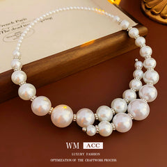 Glazenya Irregular Cross Pearl Choker — close-up of cross motif and pearls
