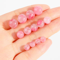 Pink chalcedony round beads, smooth polish, assorted 6–10 mm — Rosette Whisper.