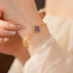 Violet Fleur Elegance Bracelet with violet clover motifs and golden beaded frames on chain
