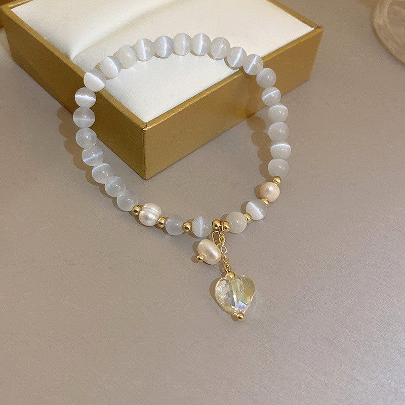 Multi-style cat’s eye and pearl bracelet collection – chic women’s accessories
