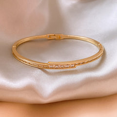 Linea Crystal Channel Bangle in gold tone with channel-set crystals – Glazenya