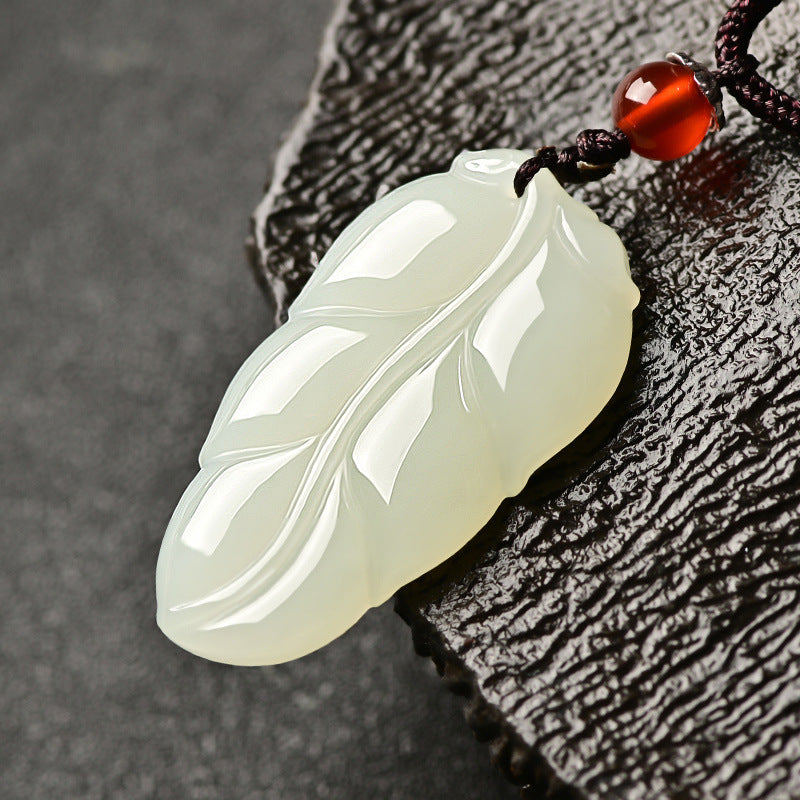 Hetian (nephrite) white jade leaf pendant close-up – Golden Bough, 38×21×8 mm