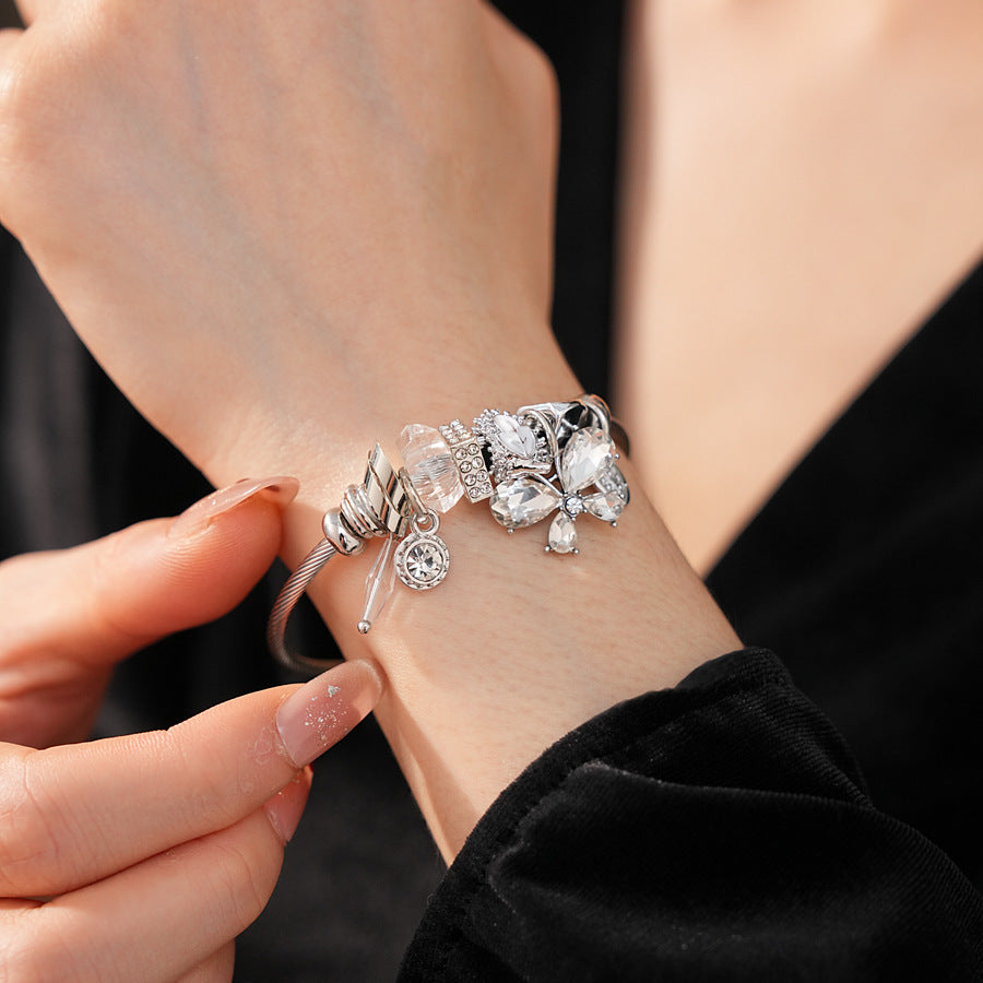Glimmerwing Luxe Charm Bangle with butterfly and crystal charms – Glazenya jewelry