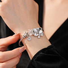 Glimmerwing Luxe Charm Bangle with butterfly and crystal charms – Glazenya jewelry