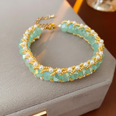 Braided glass-pearl and crystal bracelet with gold extender chain in Coffee Amber/Violet/Jade Green — Braided Pearl Crystal Bracelet.