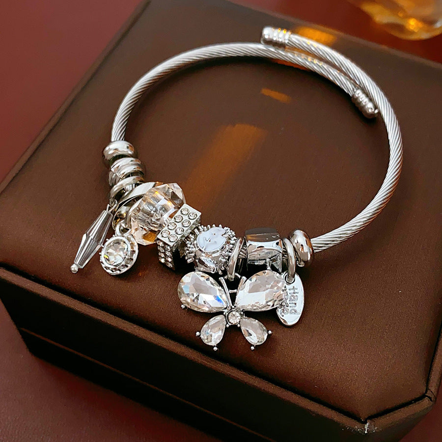 Glimmerwing Luxe Charm Bangle with butterfly and crystal charms – Glazenya jewelry