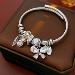Glimmerwing Luxe Charm Bangle with butterfly and crystal charms – Glazenya jewelry