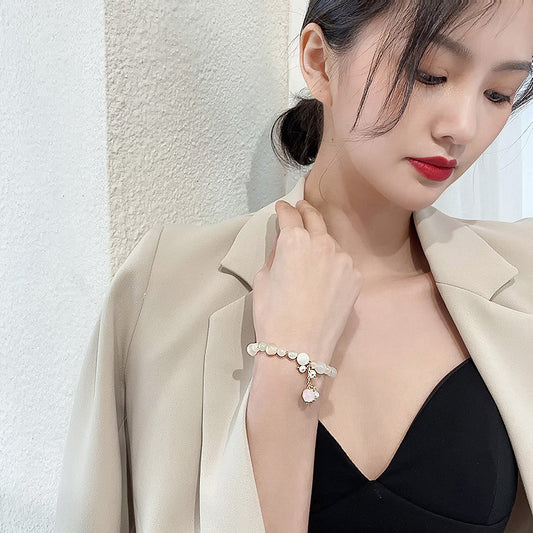 Multi-style cat’s eye and pearl bracelet collection – chic women’s accessories