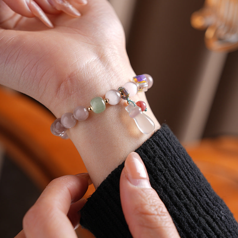 Pastel cat’s-eye and chalcedony beaded bracelet with frosted cat pendant — Moonlit Cat’s Eye Charm Bracelet by Glazenya.