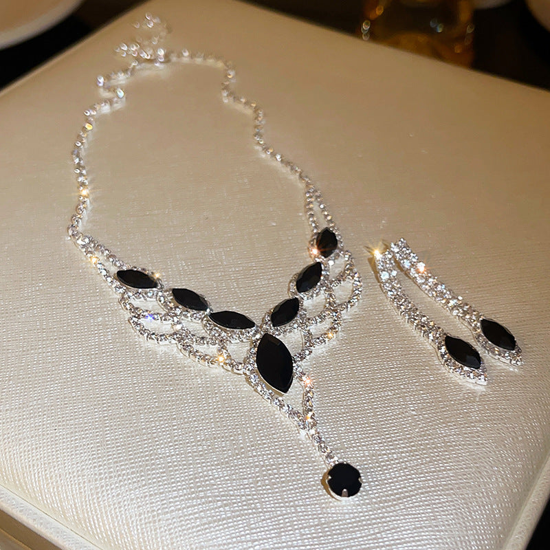 Glazenya Celestial Leaf Zircon Drop Jewelry Set — colorful water-drop zircon stones with leaf motifs; light-luxury necklace set with matching earrings and bracelet/ring variants