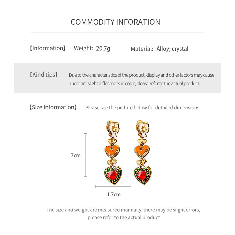 Enchanted Love Drop Earrings – vintage baroque heart-shaped dangle design with gold alloy and red crystal accents, 7cm length jewelry display