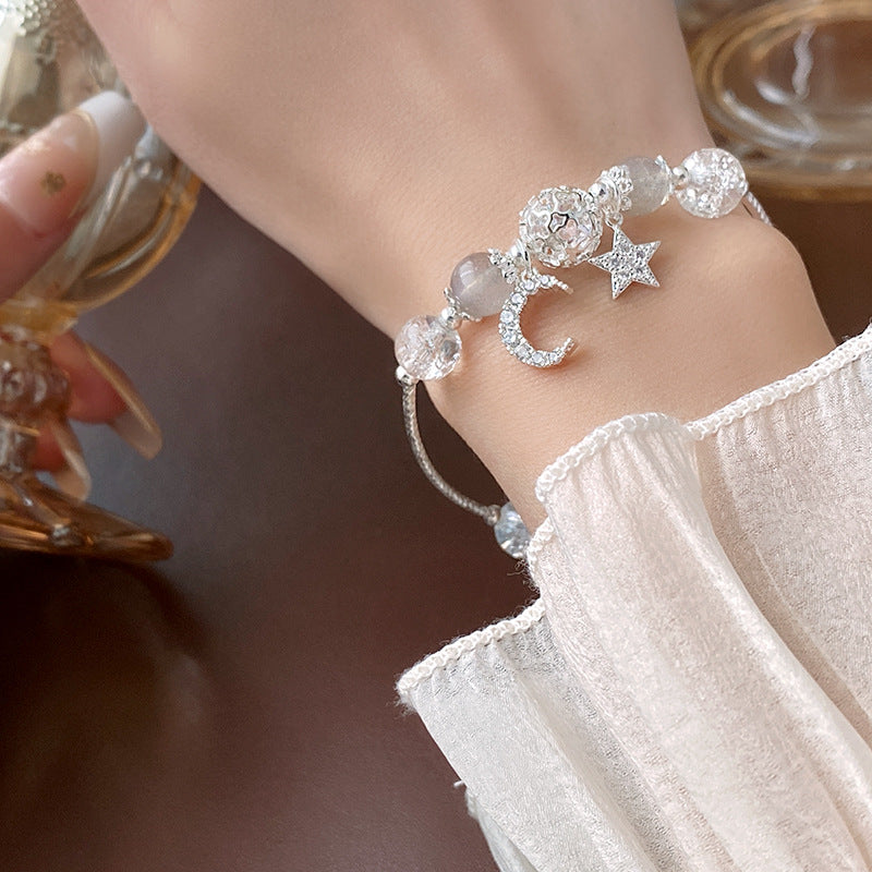Stellar Moonlight Crystal Bracelet with star and moon charm – clear crystal beads