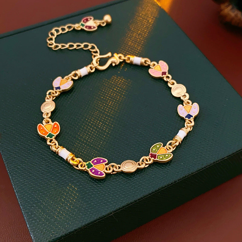 Product size chart for Vintage Enamel Floral Bracelet in golden alloy with enamel flowers
