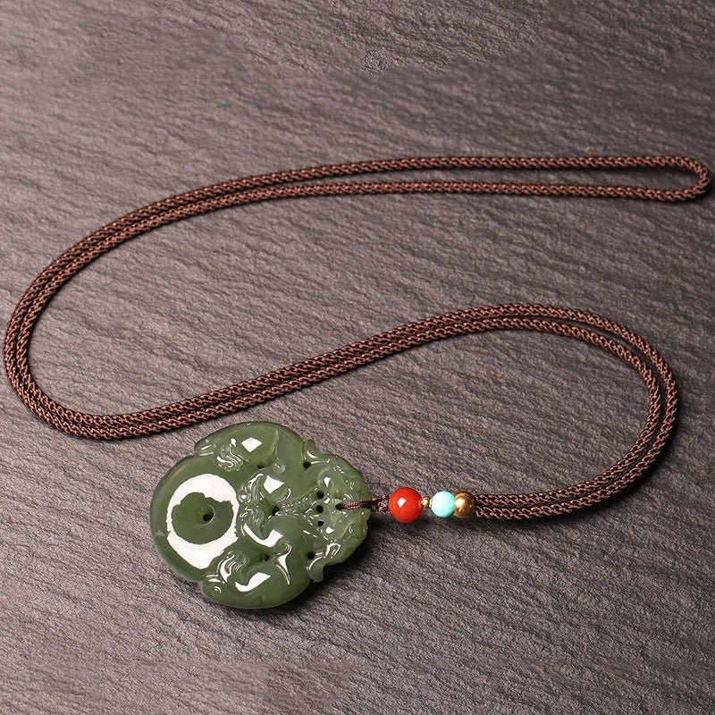Hand-carved Hetian (nephrite) jade Pi Xiu pendant in glossy celadon green — Fortune Guardian Hetian Jade Pendant.