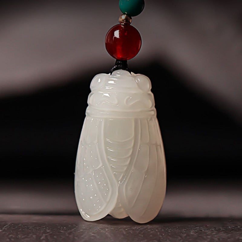 Hand-carved Hetian (nephrite) jade cicada pendant with glossy white finish — Celestial Song Hetian Jade Pendant.