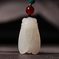 Hand-carved Hetian (nephrite) jade cicada pendant with glossy white finish — Celestial Song Hetian Jade Pendant.