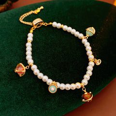 Fleur de Pearl Luxe Set with pearl necklace and matching zircon-accented bracelet, elegant and romantic