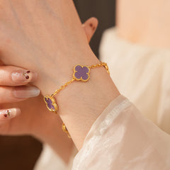 Violet Fleur Elegance Bracelet with violet clover motifs and golden beaded frames on chain
