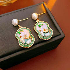 Pearl stud drop earrings with lilac and green enamel cameo and gold accents — Verdant Cameo Pearl Enamel Drops.